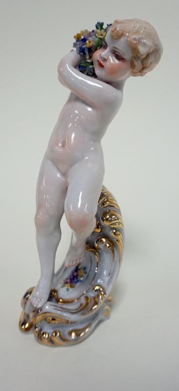 LUIGI FABRIS PORCELAIN NUDE FIGURE: LUIGI FABRIS ITALIAN PORCELAIN NUDE FIGURE OF WOMAN HOLDING FLOWERS, 7 1/4 IN HIGH