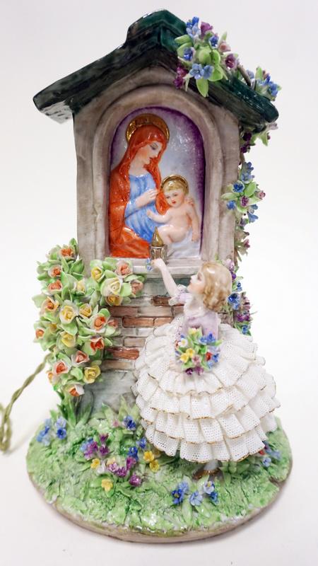LUIGI FABRIS PORCELAIN FIGURE OF WOMAN: LUIGI FABRIS PORCELAIN FIGURE OF WOMAN IN LACE DRESS PICKING FLOWERS UNDER THE IMAGE OF MARY AND BABY JESUS, WHICH IN TURN IS BACKLIT. APPROXIMATELY 8 1/2 IN HIGH