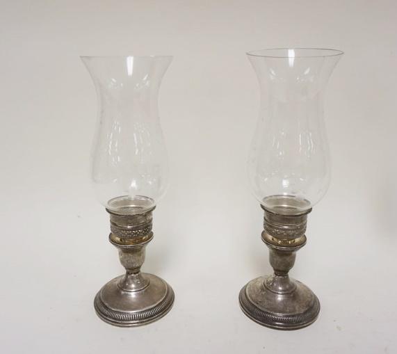 PAIR OF STERLING WEIGHTED CANDLESTICKS (1 of 2)