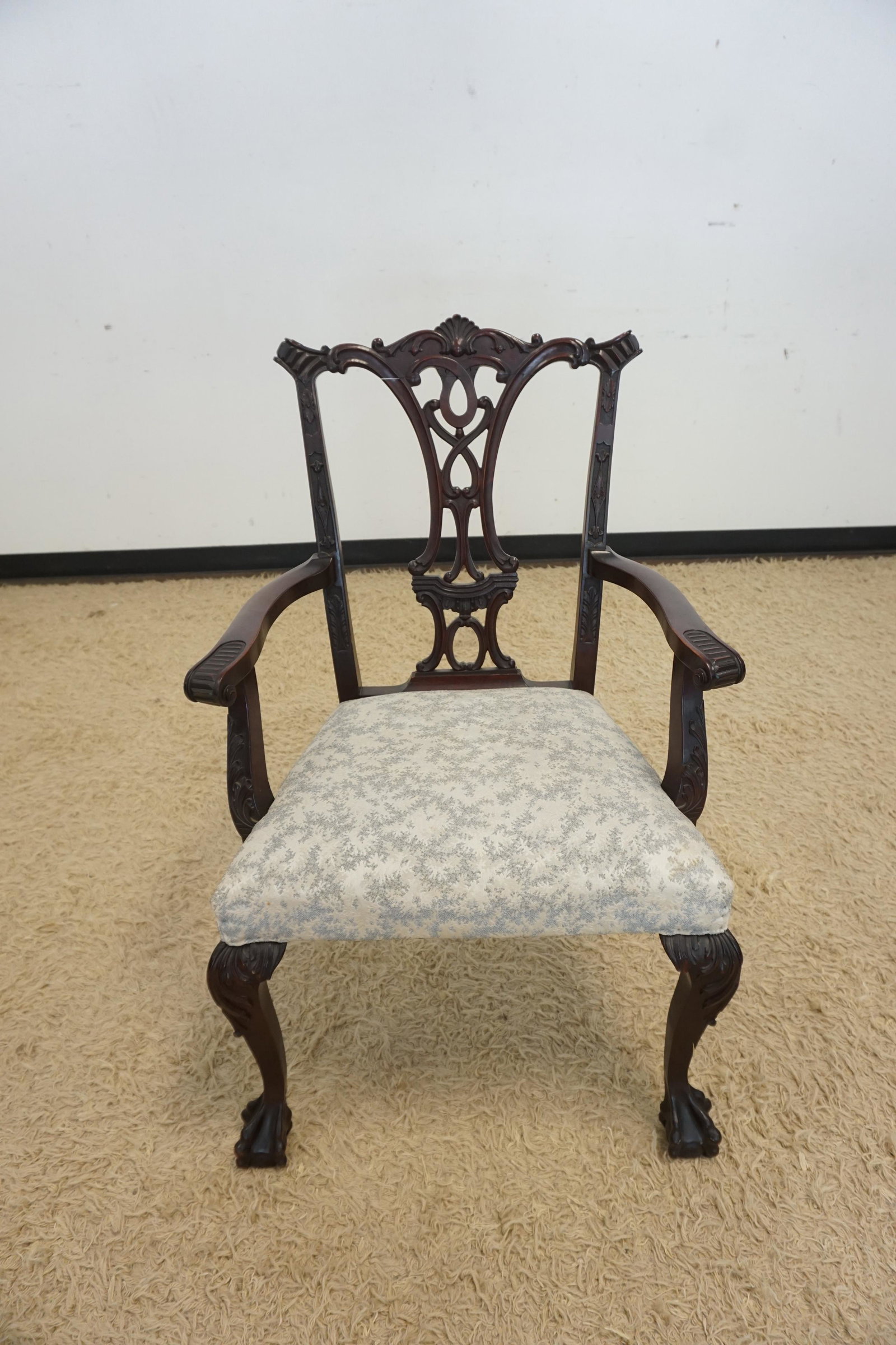 CARVED CHIPPENDALE STYLE ARMCHAIR: CARVED CHIPPENDALE STYLE ARMCHAIR W/BALL & CLAW FEET
