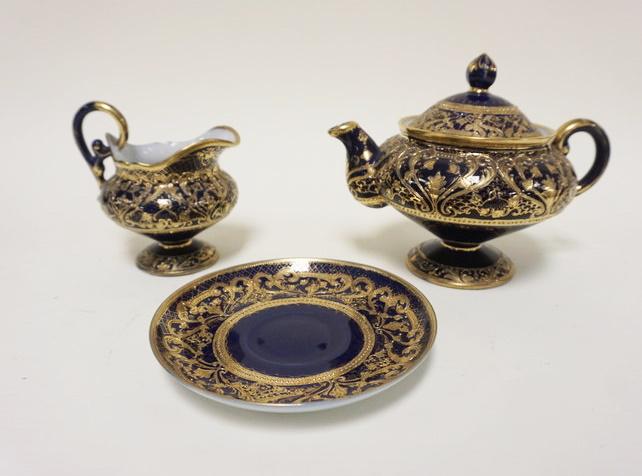 HAND PAINTED NIPPON: HAND PAINTED NIPPON, TEAPOT, CREAMER & CUP UNDERPLATE, ALL HAVING GILT DECORATIONS, TEAPOT IS APPROXIMATELY 6 1/4 IN HIGH