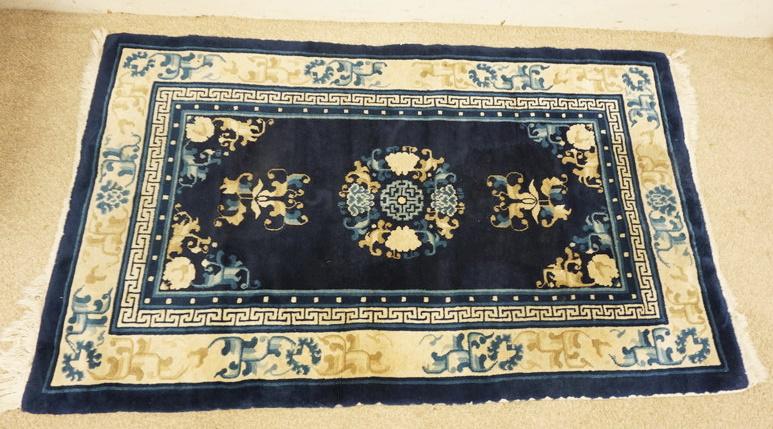 SMALL ORIENTAL THROW RUG (1 of 4)