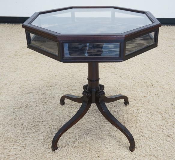 OCTAGON DISPLAY CASE: OCTAGON DISPLAY CASE ON DUNCAN PHYFE STYLE LEGS, CASE HAS TILT, APPROXIMATELY 26 IN X 27 IN