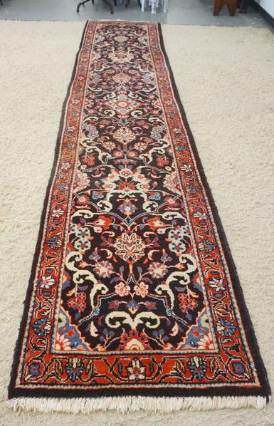 HAND WOVEN PERSIAN WOOL RUNNER: HAND WOVEN PERSIAN WOOL RUNNER, APPROXIMATELY 14 FT 4 IN X 2 FT 10 IN