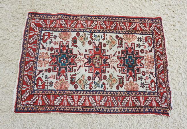 ANTIQUE PERSIAN THROW RUG: ANTIQUE PERSIAN THROW RUG, APPROXIMATELY 2 FT 4 IN X 3 FT 4 IN