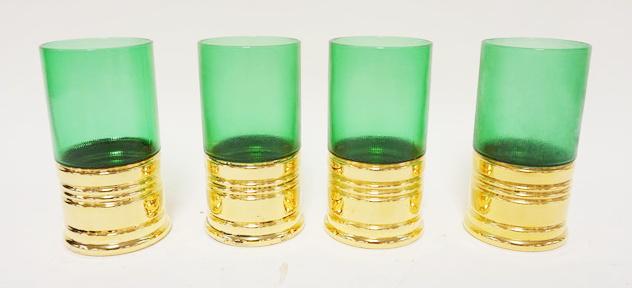 LOT OF 4 GREEN GLASS SHOTGUN SHELL GLASSES: LOT OF 4 GREEN GLASS SHOTGUN SHELL GLASSES, APPROXIMATELY 5 3/4 IN HIGH