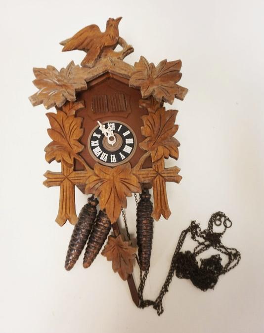 CARVED WOODEN CUCKOO CLOCK: CARVED WOODEN CUCKOO CLOCK W/ACORN CHIMES, CLOCK ALONE IS APPROXIMATELY 4 3/4 IN X 7 IN