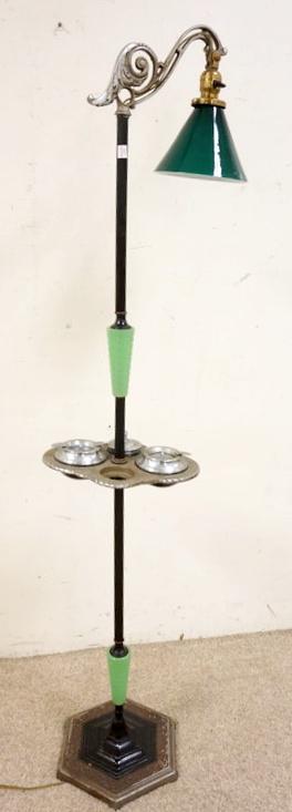 ART DECO FLOOR LAMP: ART DECO FLOOR LAMP W/SMOKING ACCESSORIES ON CENTER SHELF HAVING A GREEN CASED GLASS SHADE, ONE PIECE ON SHELF IS MISSING, APPROXIMITAELY 57 IN HIGH