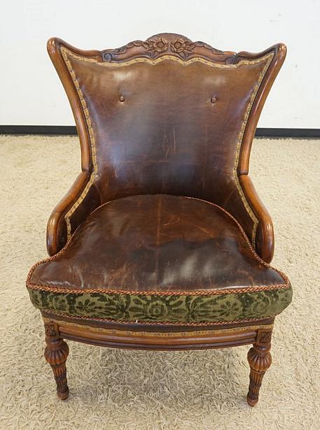 UPHOLSTERED ARMCHAIR: UPHOLSTERED ARMCHAIR W/LEATHER BACK & REVERSIBLE LEATHER CUSHION, WEAR TO LEATHER FINISH