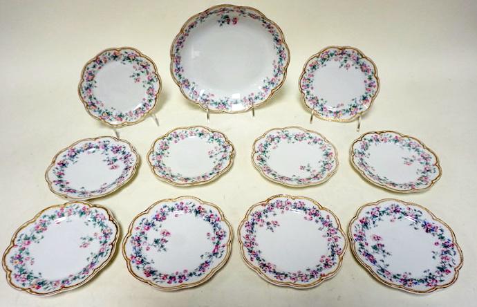 LIMOGES 11 PIECE ICE CREAM SET: LIMOGES 11 PIECE ICE CREAM SET WITH 1 -9 IN MASTER BOWL AND 10 - 6 1/4 IN PLATES, 1 WITH SMALL RIM CHIP