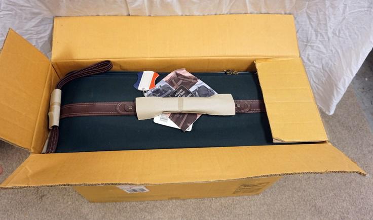 AMERICAN TOURISTER SUITCASE IN BOX: AMERICAN TOURISTER SUITCASE IN BOX, NEVER USED, APPROXIMATELY 9 IN X 27 IN X 22 IN HIGH