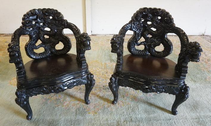 PAIR OF HEAVILY CARVED ASIAN CHAIRS (1 of 5)