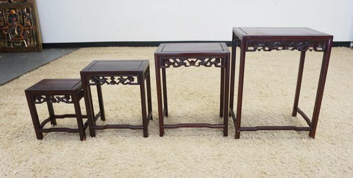 NEST OF 4 ASIAN TABLES: NEST OF 4 ASIAN TABLES W/FRETWORK CARVED SKIRTS, APPROXIMATELY 20 IN X 14 IN X 26 IN HIGH