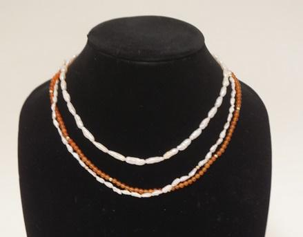 TWO PEARL NECKLACES: GROUP OF TWO PEARL NECKLACES, ONE OF CULTURED BAROQUE FRESHWATER PEARS OF VARYING SIZES, & ONE DOUBLE STRAND W/ ONE STRAND BEING CULTURED BAROQUE FRESHWATER PEARLS AND THE OTHER ORANGE BEADS (POSSIBLY