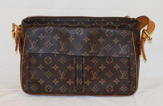 LOUIS VUITTON HANDBAG: LOUIS VUITTON HANDBAG SOME STAINING INSIDE, UNKNOWN IF AUTHENTIC. APPROXIMATELY 14 IN L X 8 1/2 H X 4 IN