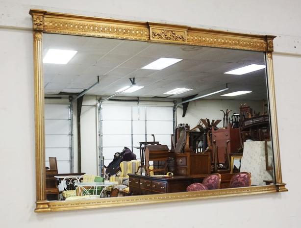 GILT FRAMED MIRROR: MIRROR IN GILT FINISHED FRAME WITH REEDED COLUMNS, APPROXIMATELY 43 IN X 28 IN H