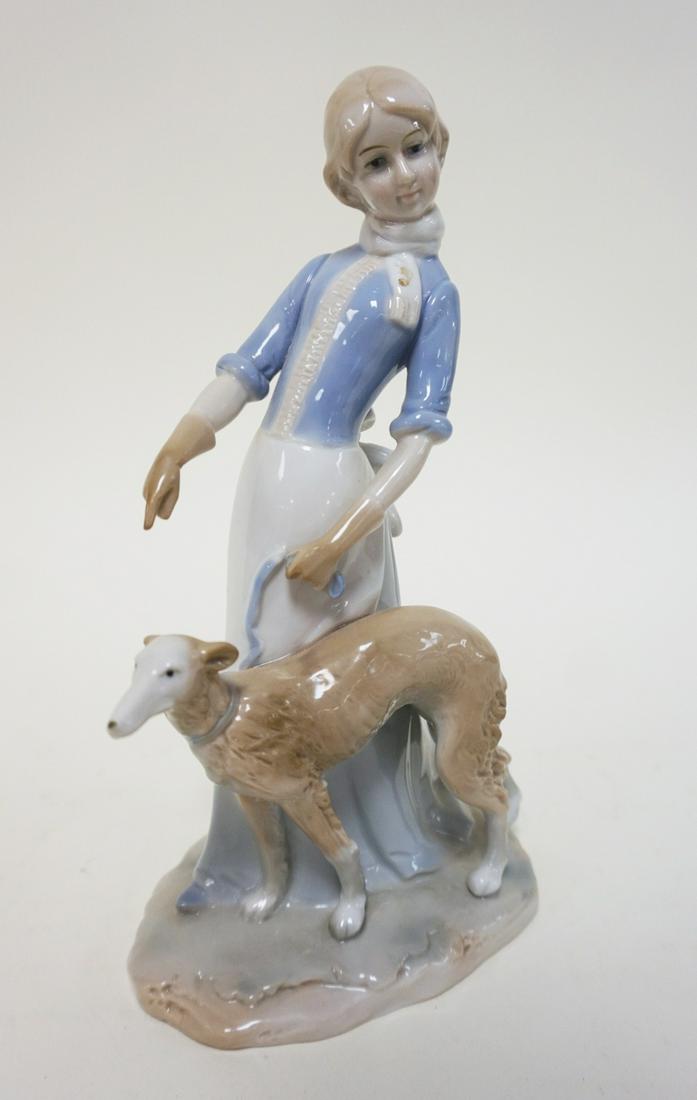 KPM CONTEMPORARY PORCELAIN FIGURE: KPM CONTEMPORARY PORCELAIN FIGURE OF WOMAN WALKING A DOG, APPROXIMATELY 8 3/4 IN HIGH