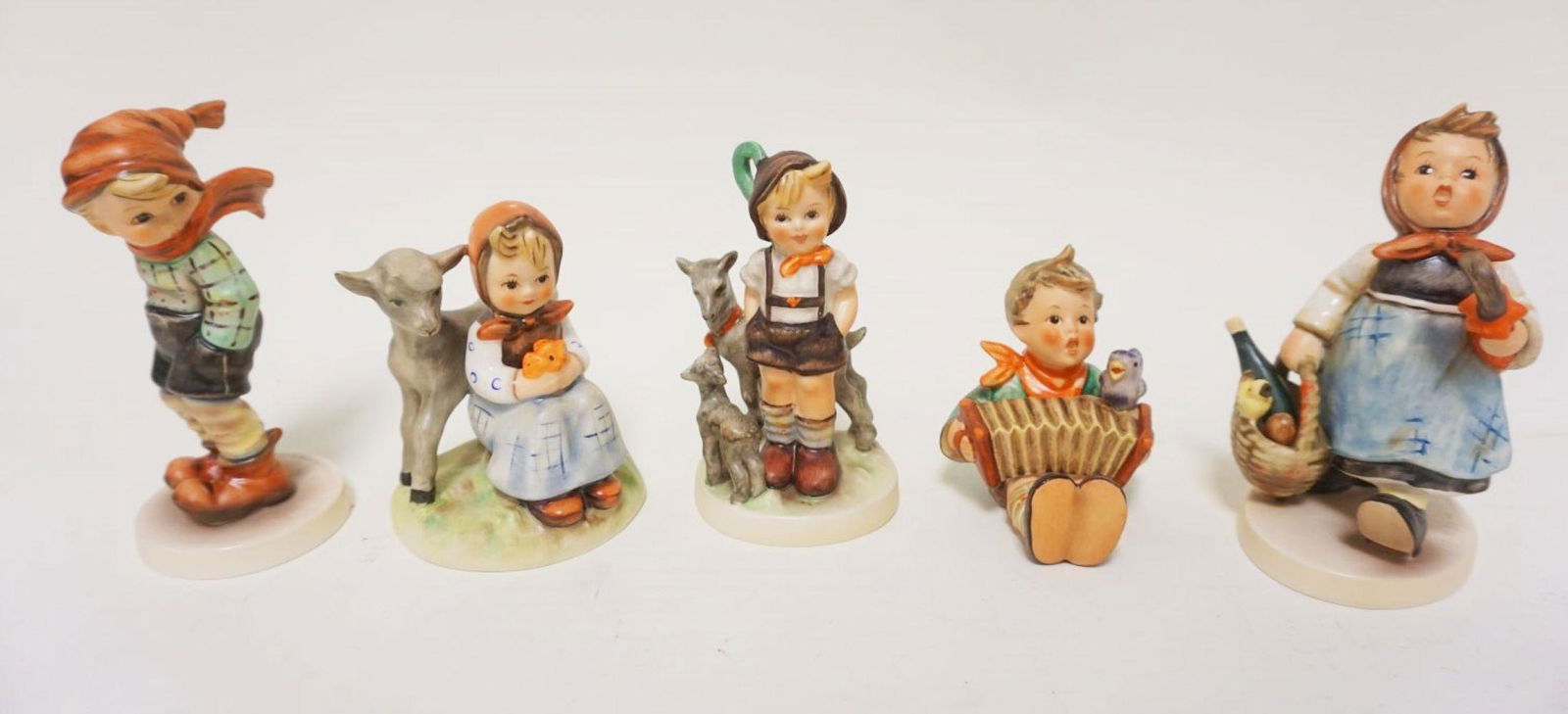 5 GOEBEL HUMMEL FIGURINES (1 of 2)