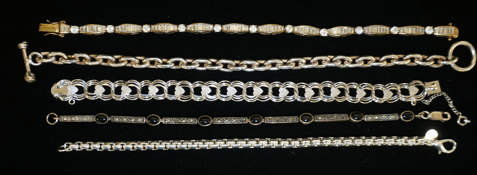 5 STERLING SILVER BRACELETS (1 of 2)