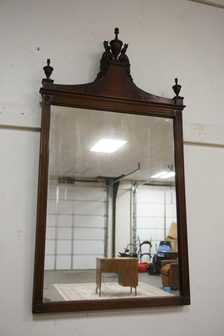 MAHOGANY WALL MIRROR: MAHOGANY WALL MIRROR W/CARVED URNS ON CREST, APPROXIMATELY 25 IN X 46 IN