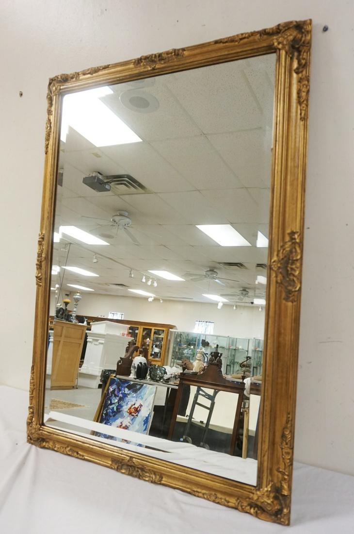 WALL MIRROR IN GILT DECORATED FRAME: WALL MIRROR IN GILT DECORATED FRAME, APPROXIMATELY 33 IN X 47 IN