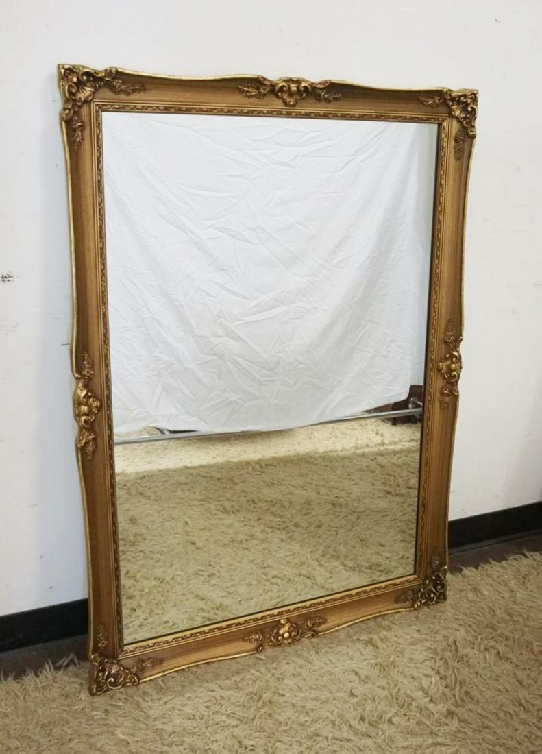 BEVELED EDGE MIRROR IN ORNATE GILT FRAME (1 of 2)
