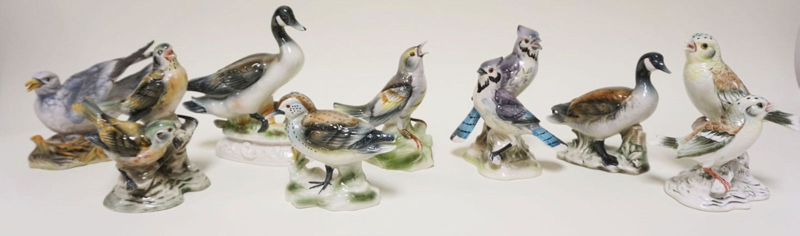 LOT OF 8 PORCELAIN BIRD STATUES (1 of 3)