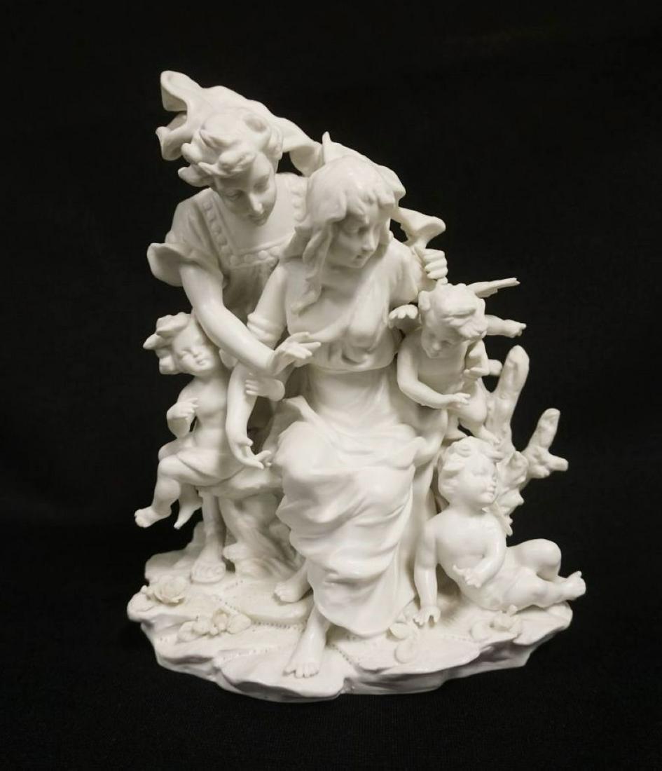 BISQUE STATUE OF MAN & WOMAN: BISQUE STATUE OF MAN & WOMAN W/CHERUBS, APPROXIMATELY 8 1/2 IN HIGH