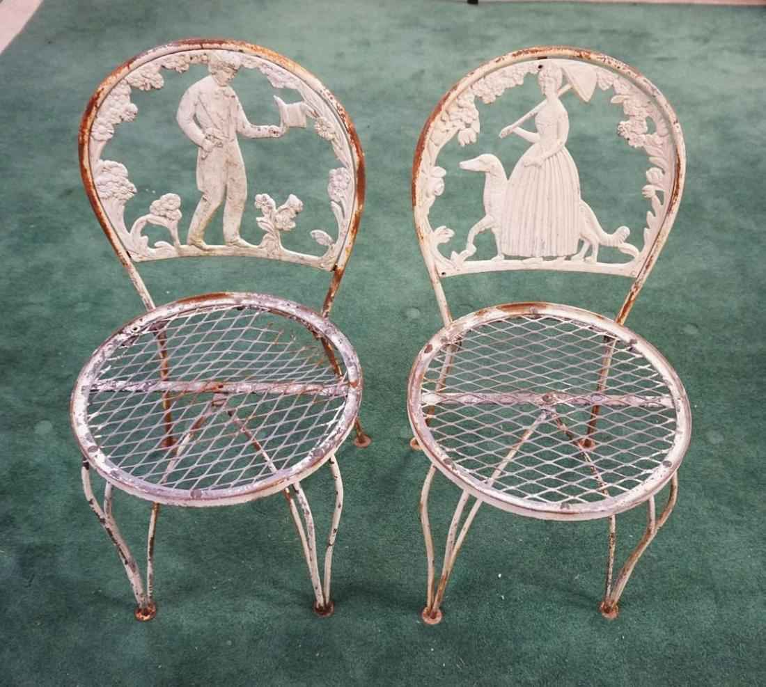 PAIR OF METAL GARDEN CHAIRS: PAIR OF METAL GARDEN CHAIRS W/CAST METAL COURTING SCENES