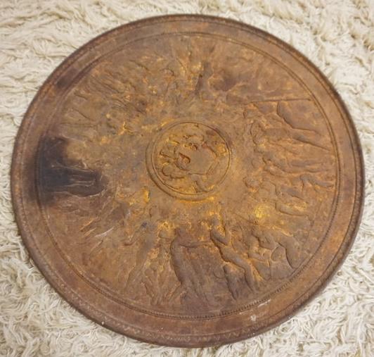 ROUND CAST IRON EMBOSSED PIECE: ROUND CAST IRON PIECE WITH EMBOSSED NEO CLASSICAL FIGURES, APPROXIMATELY 16 IN
