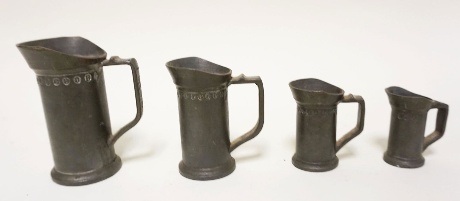 LOT OF 4 ANTIQUE PEWTER MEASURES (1 of 3)