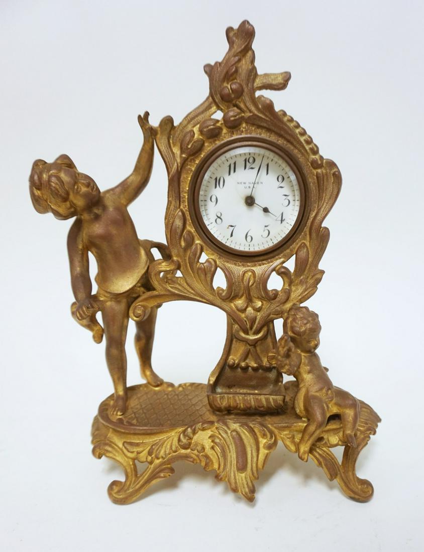 NEW HAVEN CAST METAL FIGURAL CLOCK (1 of 2)
