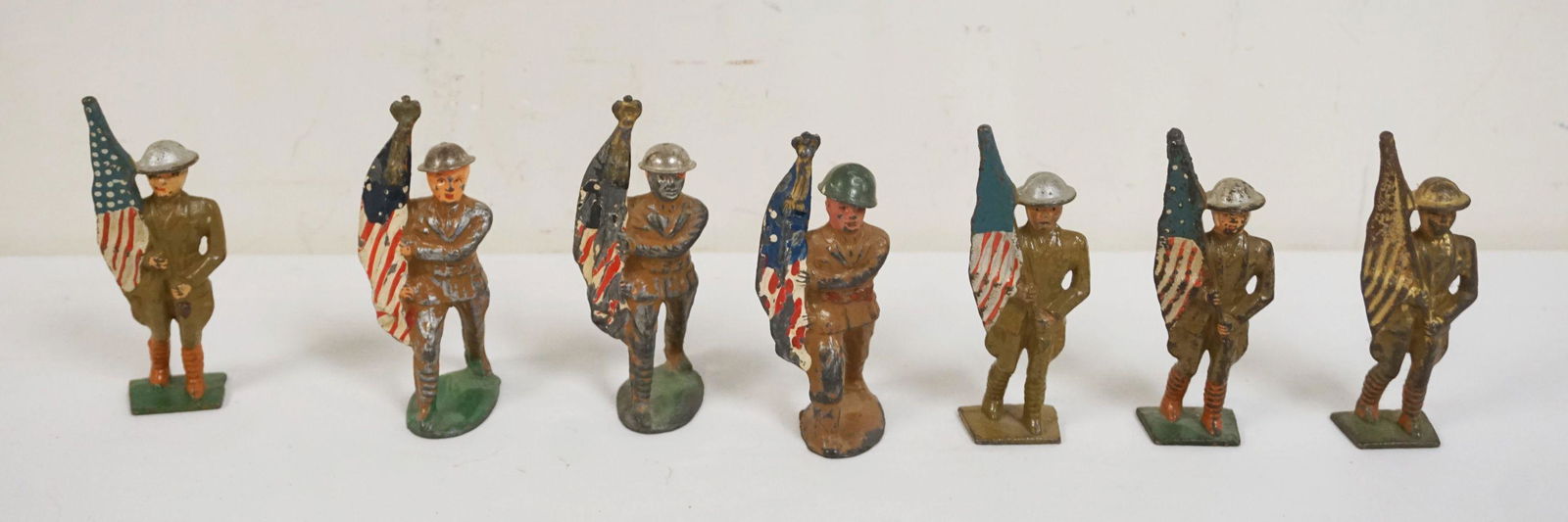 LOT OF 7 ANTIQUE CAST METAL WWI SOLDERS (1 of 3)