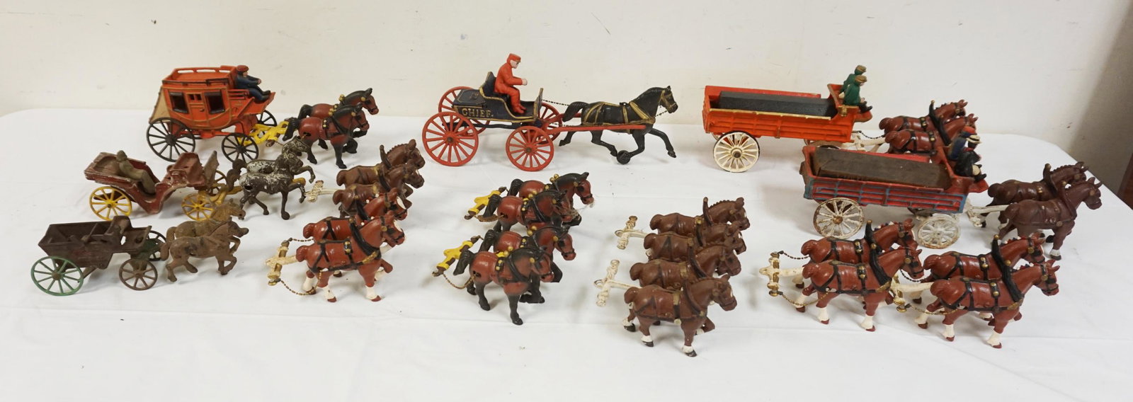 LARGE LOT OF CAST IRON: LARGE LOT OF CAST IRON REPRODUCTION HORSE DRAWN TOYS & ACCESSORIES