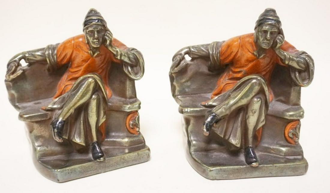 METAL BOOKENDS: METAL BOOKENDS OF A MAN SITTING, APPROXIMATELY 6 1/2 IN H