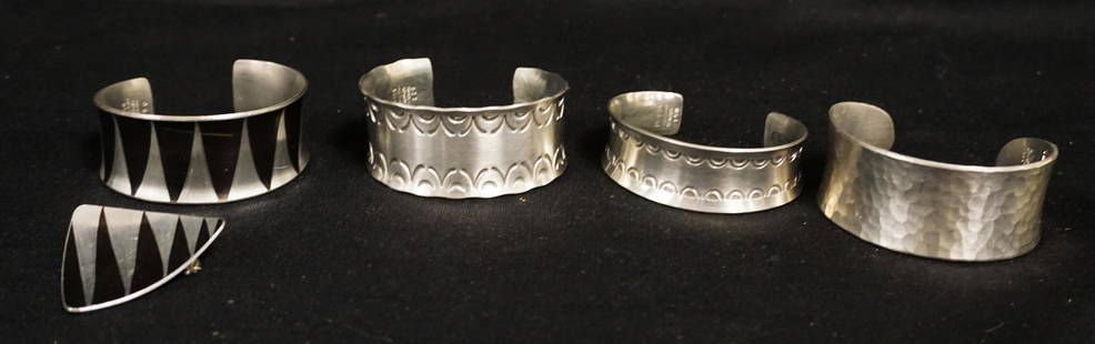 PEWTER JEWELRY LOT: PEWTER JEWELRY LOT INCLUDES 3 CUFF BRACELETS & A BROOCH, SIGNED JORGEN JENSEN, HANDMADE DENMARK, & ONE MARKED *HANDAPBETE* BC