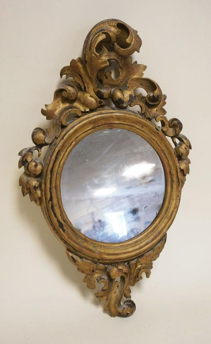 ANTIQUE GOLD FINISHED WOOD SCROLLED MIRROR: ANTIQUE GOLD FINISHED WOOD SCROLLED MIRROR, APPROXIMATELY 23 IN HIGH