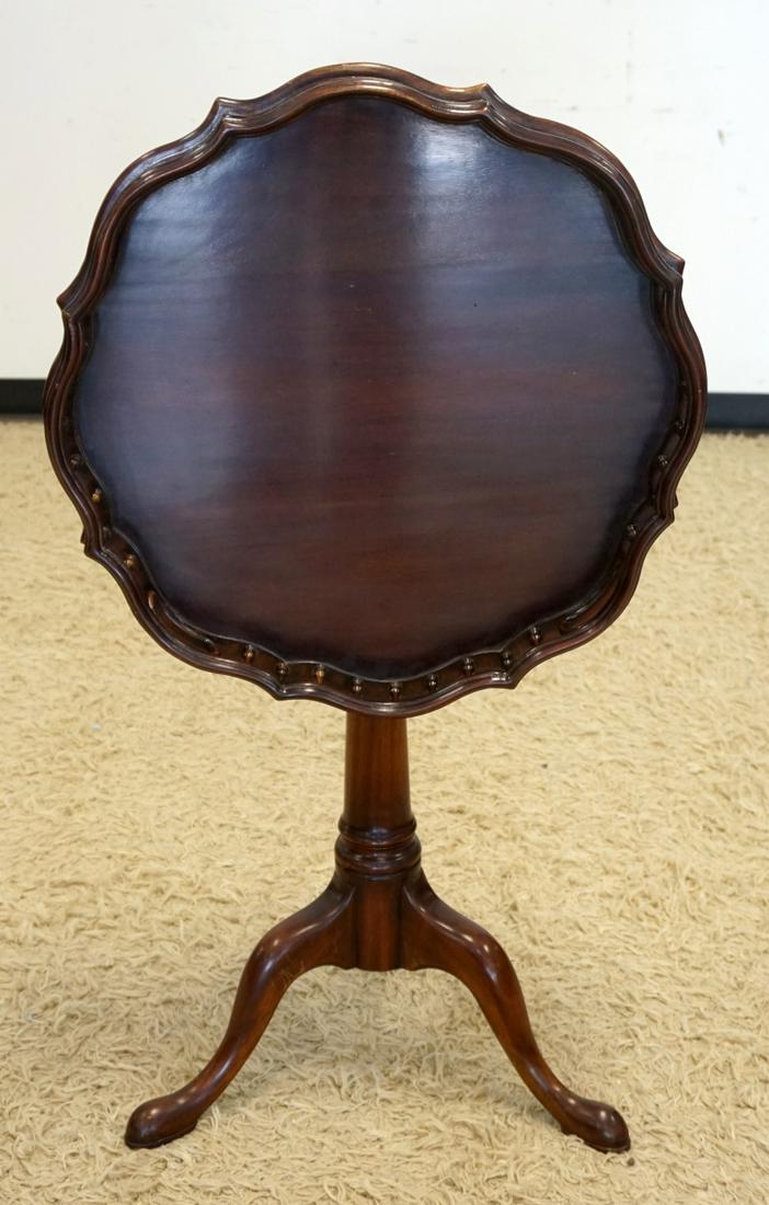 MAHOGANY TILT TOP TABLE: MAHOGANY TILT TOP TABLE W/GALLERY AROUND TOP, APPROXIMATELY 21 IN X 29 IN HIGH
