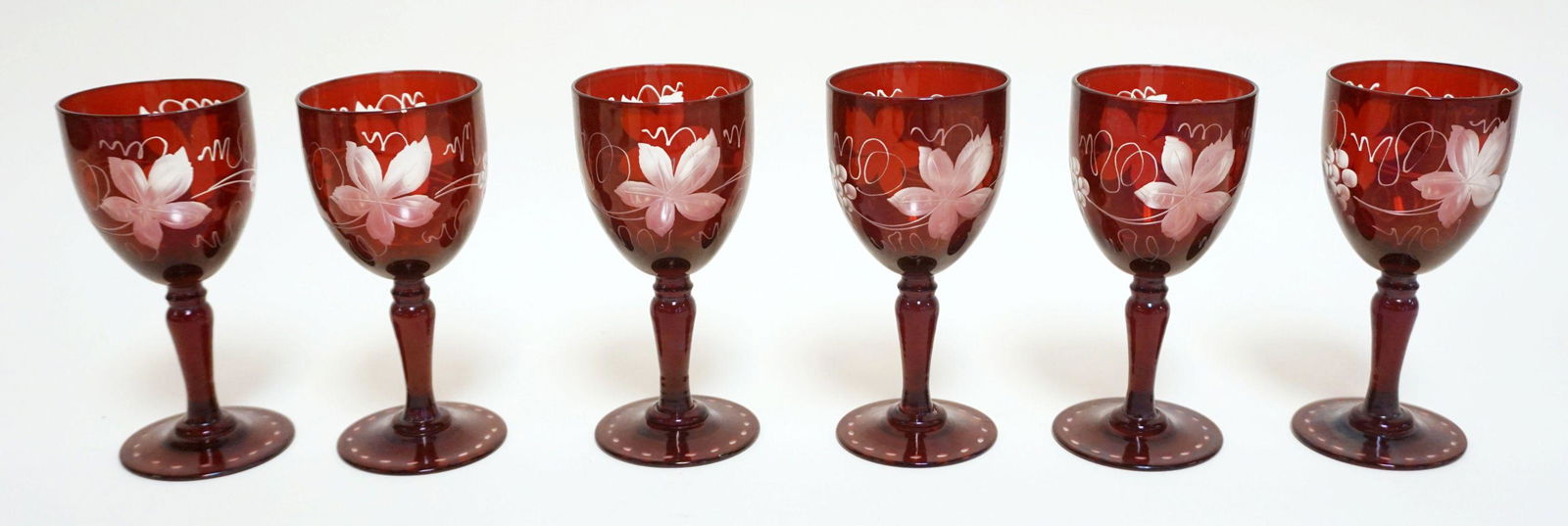 RUBY CUT TO CLEAR CORDIAL GLASSES: RUBY CUT TO CLEAR CORDIAL GLASSES, APPROXIMATELY 5 IN HIGH