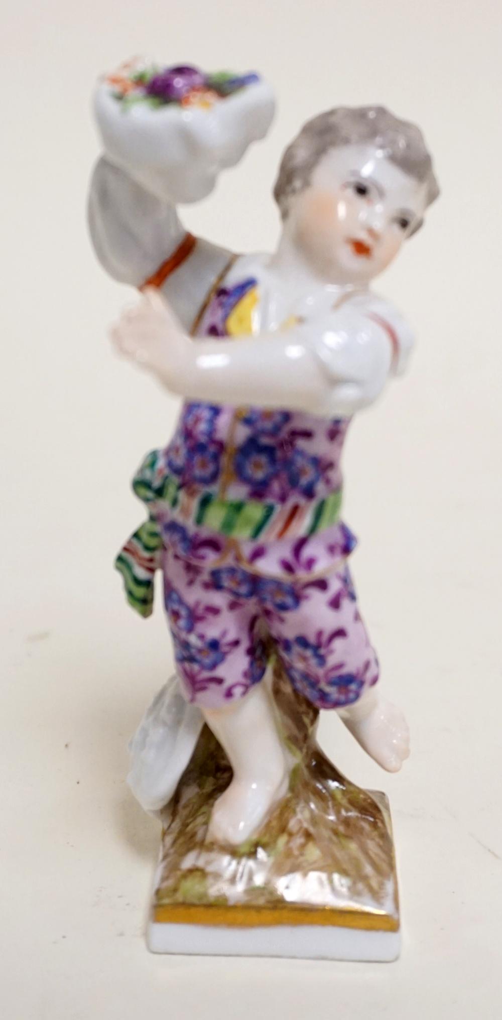 ANTIQUE PORCELAIN FIGURE OF CHILD (1 of 3)