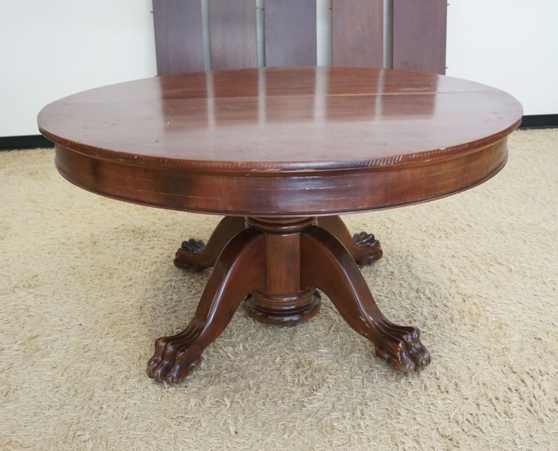 55 IN ROUND CLAW FOOT MAHOGANY TABLE (1 of 3)