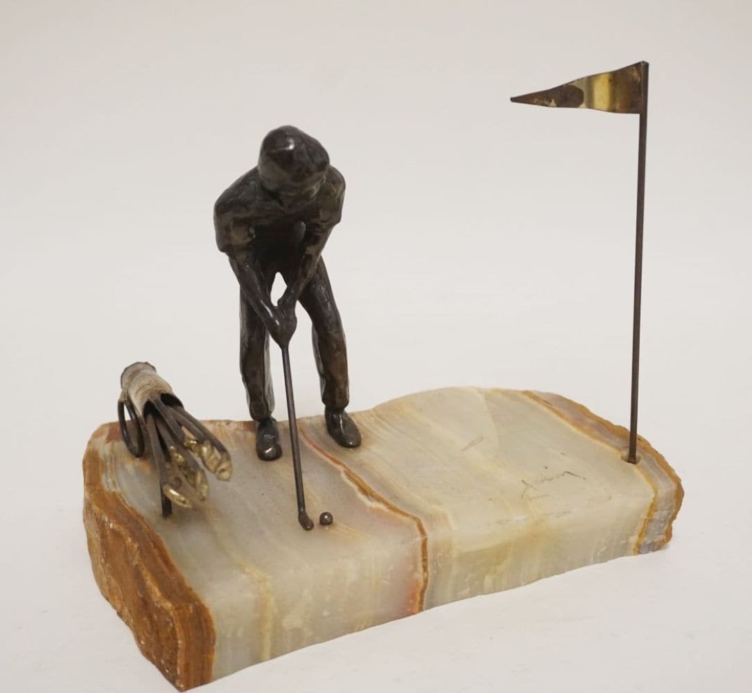 MCM METAL SCULPTURE OF MAN PLAYING GOLF (1 of 3)