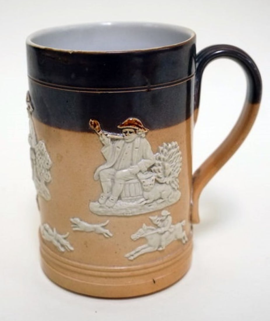 ROYAL DOULTON ENGLAND MUG: ROYAL DOULTON ENGLAND EMBOSSED MUG, APPROXIMATELY 5 1/4 IN