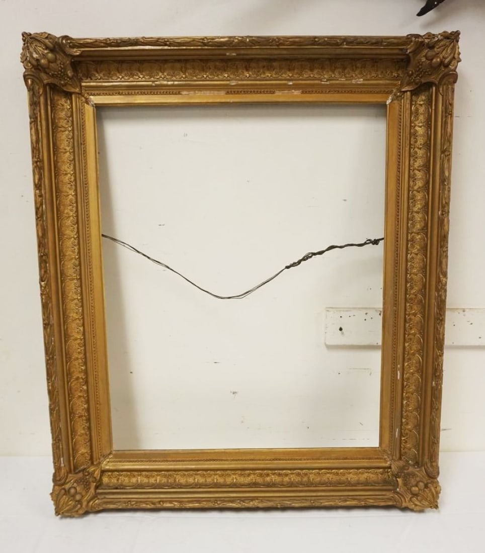 ANTIQUE ORNATE GILT FINISHED FRAME: ANTIQUE ORNATE GILT FINISHED FRAME, SOME LOSS TO GESSO, APPROXIMATELY OUTSIDE 34 IN X 39 IN, INSIDE 25 1/4 IN X 31 IN