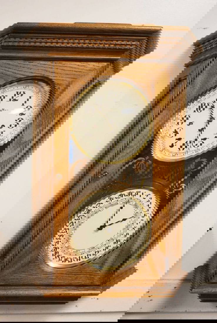 Howard Miller Calendar Clock Auction