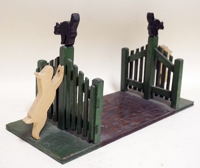 FOLK ART DOG CHASING CAT BOOKENDS (1 of 2)