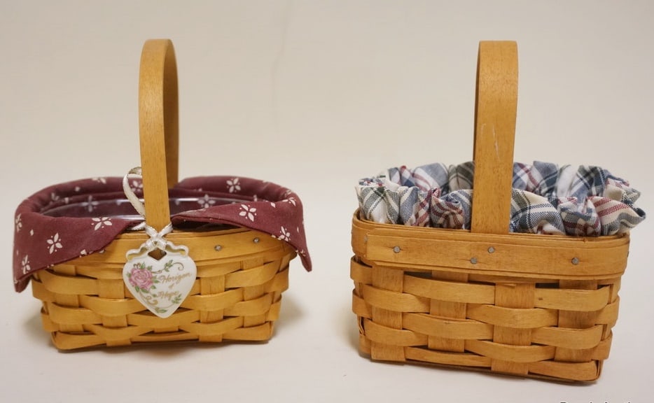 1999 AND 1995 AMERICAN CANCER SOCIETY BASKETS: AMERICAN CANCER SOCIETY BASKETS; 1999 WITH LINER, PROTECTOR AND HANG TIE; 1995 WITH LINER AND PROTECTOR. 1995 APPROXIMATELY 4 3/4 IN X 5 3/4 IN X 3 1/4 IN H