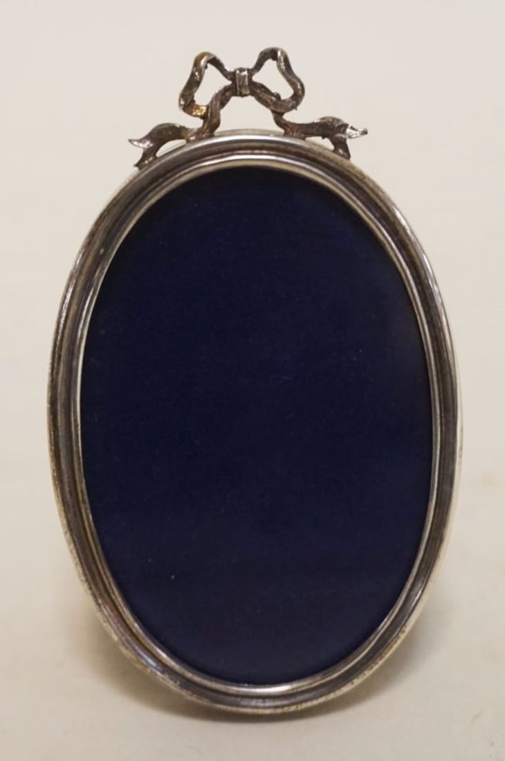 CARTIER STERLING OVAL FRAME: CARTIER STERLING OVAL FRAME, APPROXIMATELY 4 IN HIGH