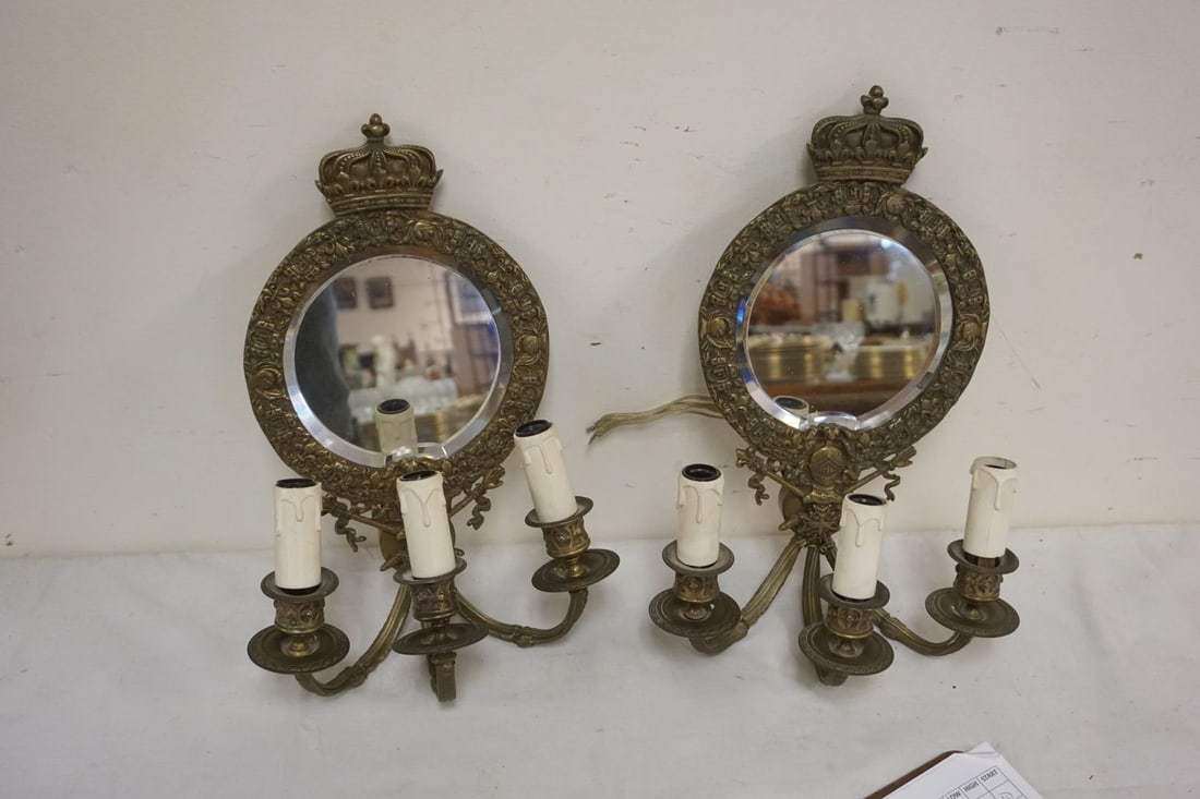 PAIR OF BRASS MIRROR BACK WALL SCONCES: PAIR OF BRASS MIRROR BACK WALL SCONCES W/KINGS CROWNS & KNIGHT HELMET MOTIF, APPROXIMATELY 15 IN HIGH