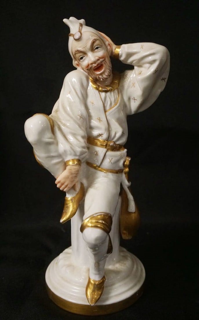 PORCELAIN FIGURE OF A JESTER (1 of 4)